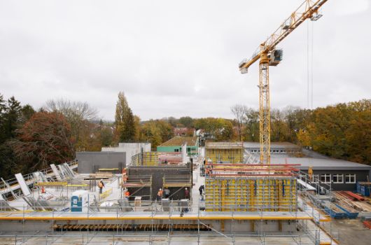 Rohbauarbeiten 2. Bauabschnitt  –  Stellen der Wandschalungen 2. Obergeschoss