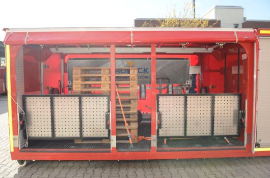 Abrollbehälter Sandsack